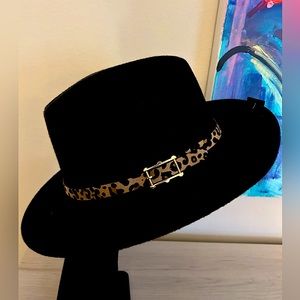 Marcus Adler Black Fedora with leopard print belt.
